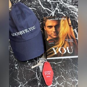 Netflix series You book, cap and keychain